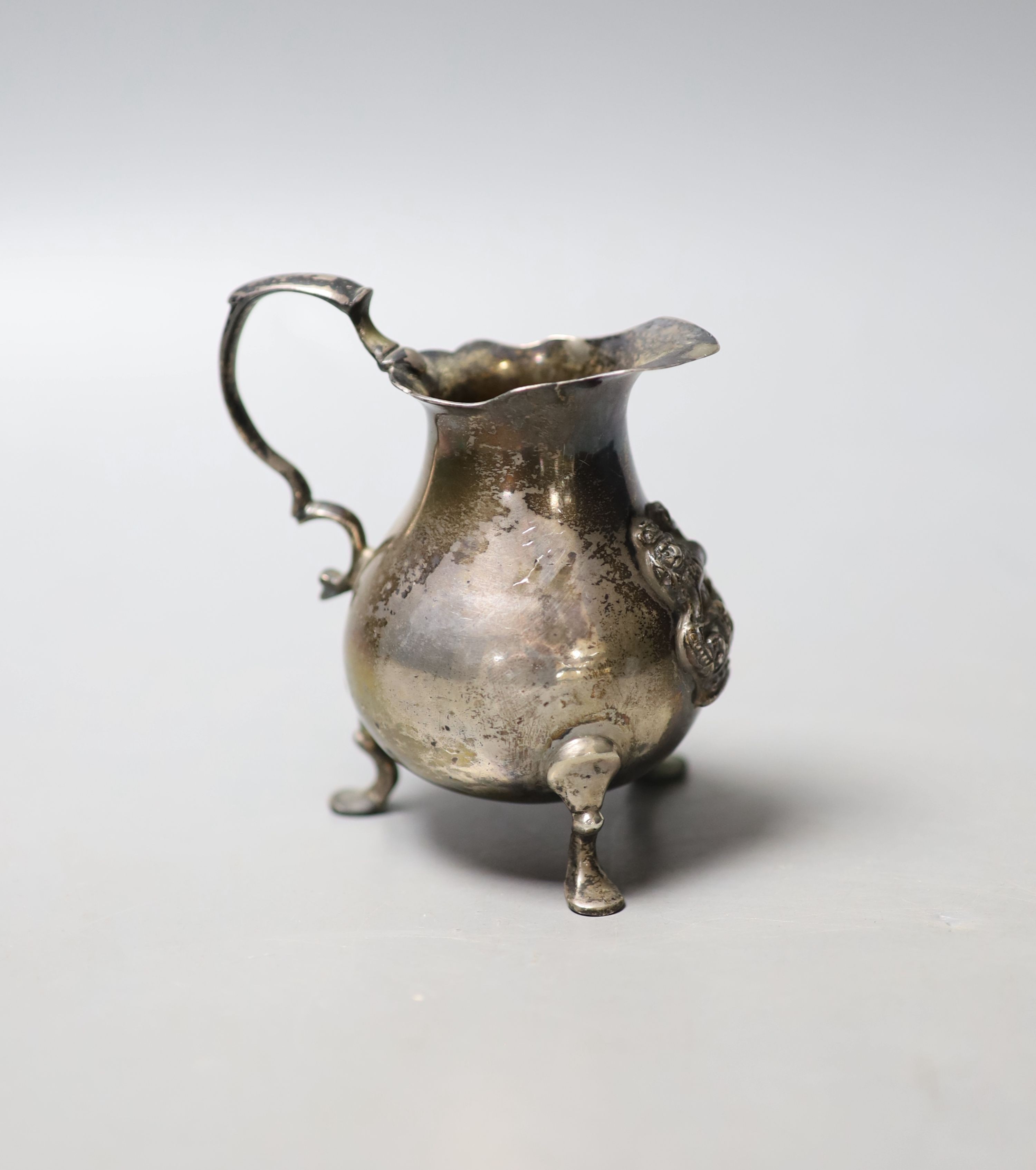 A George II silver baluster cream jug, John Pollack, London, 1742, 89mm, 114 grams.